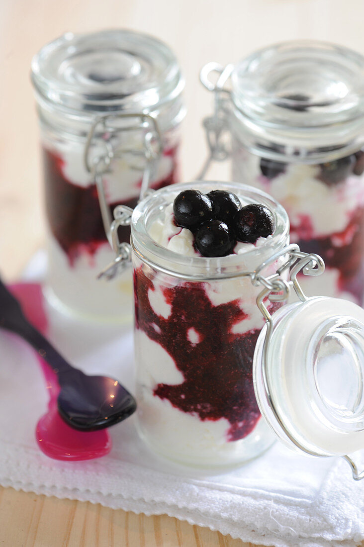 Fromage blanc and blueberry coulis jars