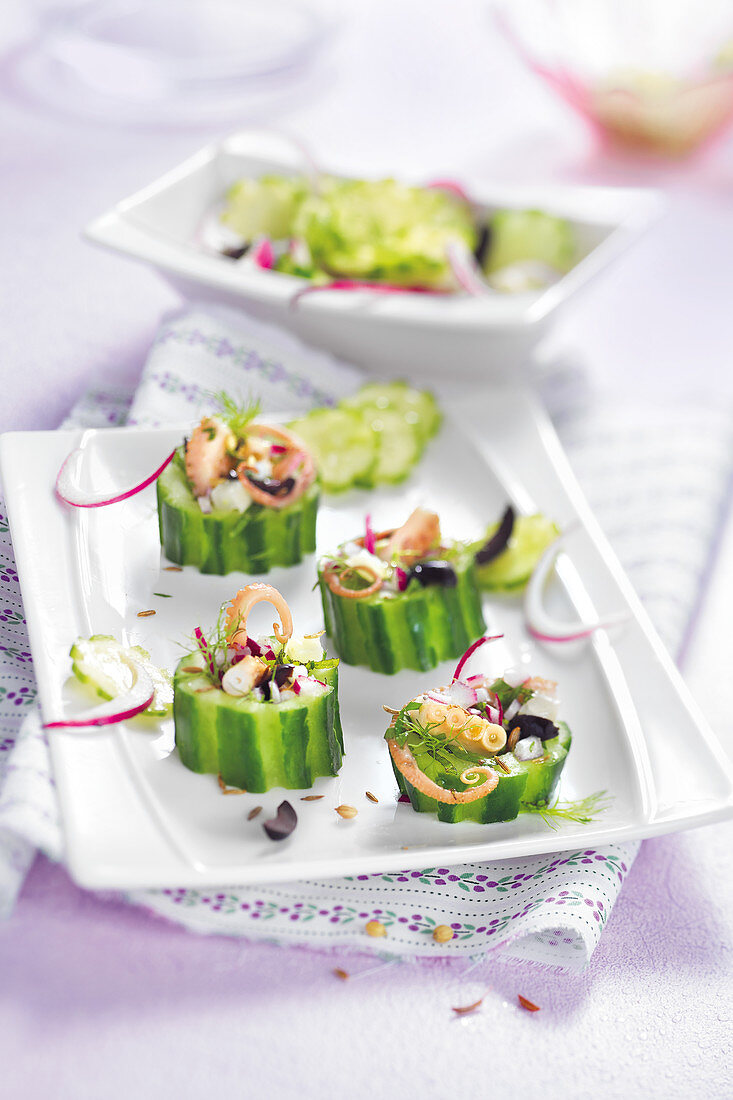 Cucumber wedges stuffed with octopus salad