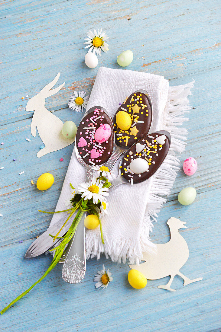 Chocolate ganache decorated for Easter on tasting spoons