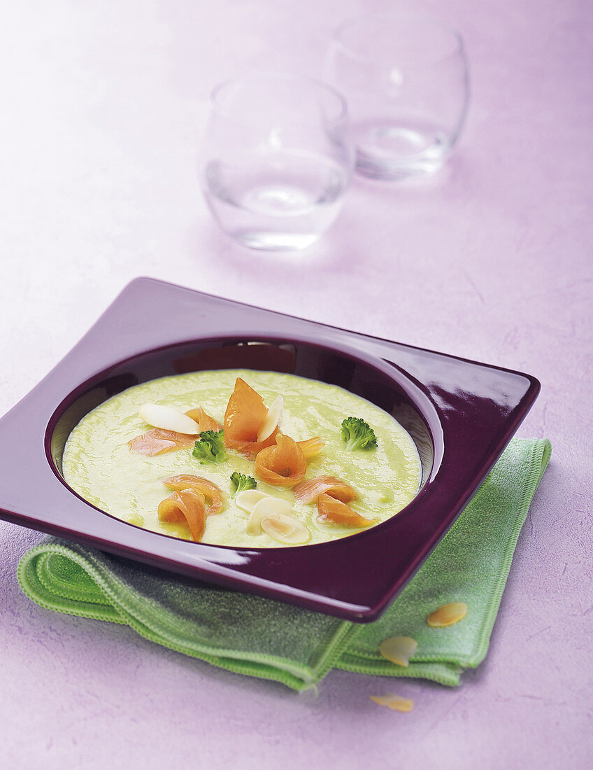 Cream of broccoli soup with almonds and salmon