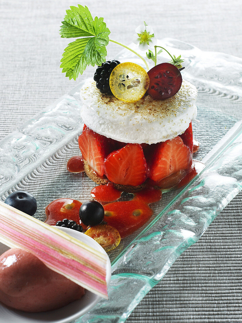 Strawberry meringue shortcake with red fruit and rhubarb sorbet and coulis