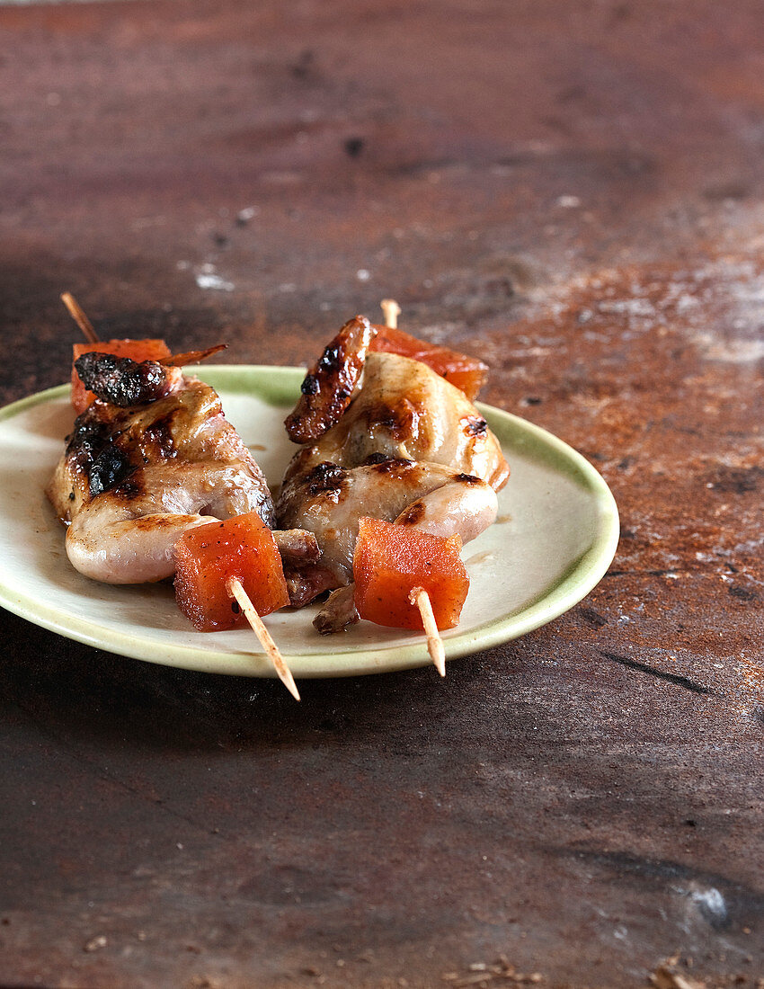 Sweet and sour quail and quince cube brochettes