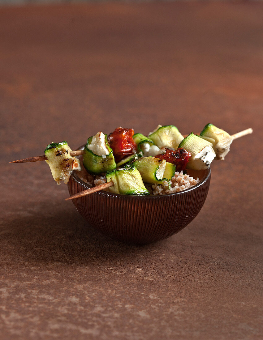 Yakitori-style courgette,cheese and confit tomato brochettes
