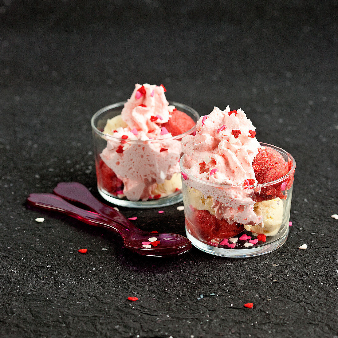 Glasses of ice cream with strawberry Tagada whipped cream