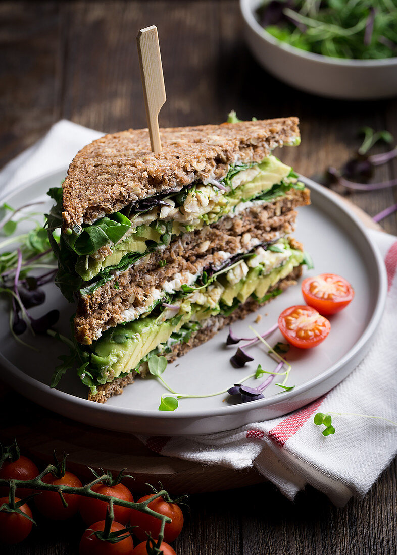 Sandwiches with smoked trout and avocado