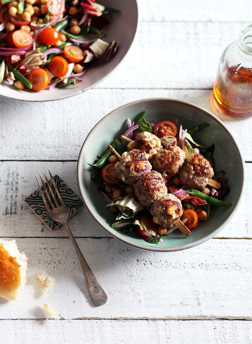 Vegetable and chickpea salad,beef meatball brochettes