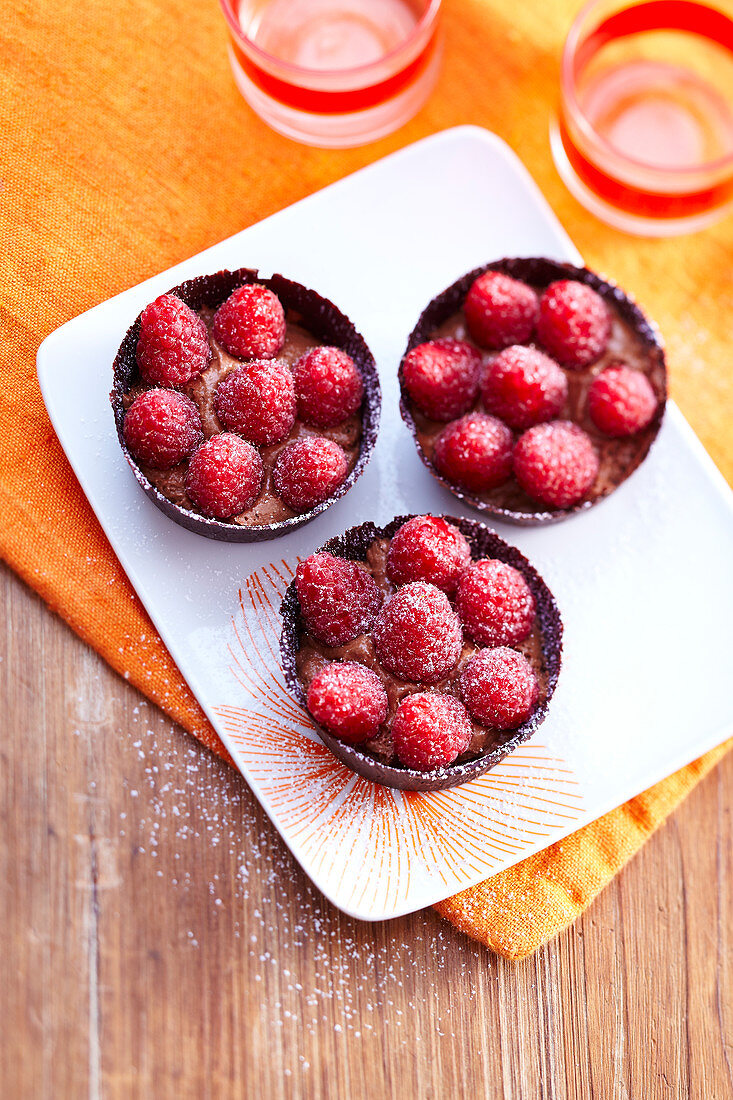 Chocolate timbales with fresh raspberries