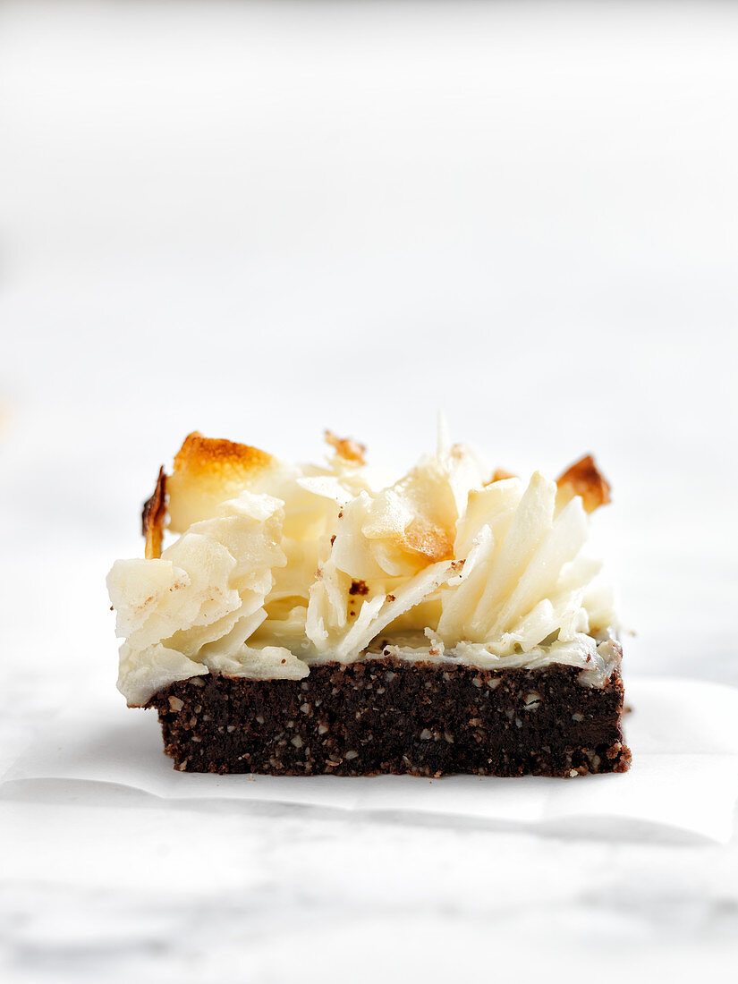 Mignardise with chocolate and dried coconut shavings