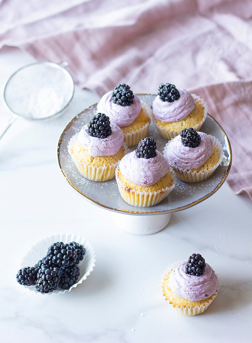 Lemon cupcakes with blackberry Fromage frais topping