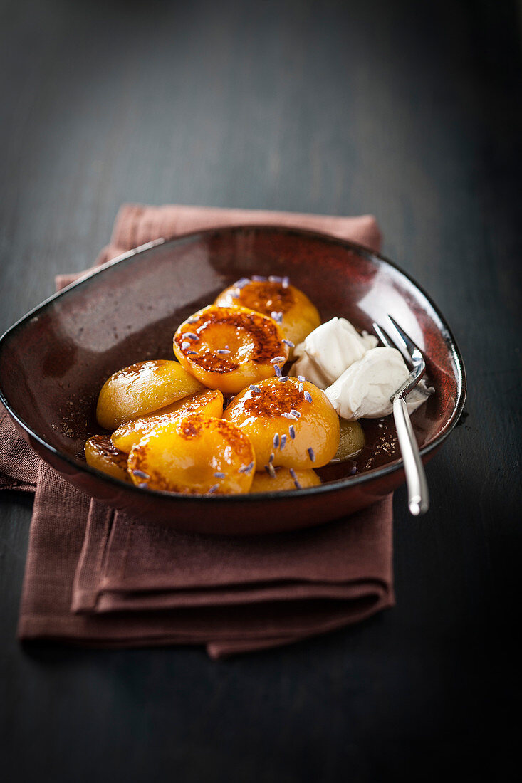 Roasted apricots with rosemary and whipped cream