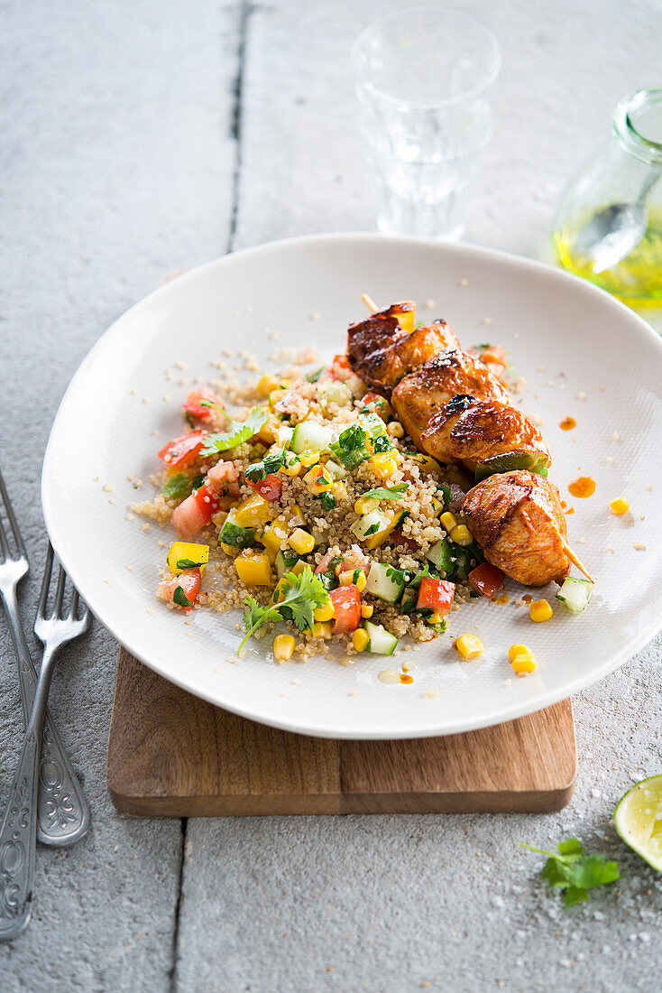 Chicken skewer with quinoa and summer vegetables