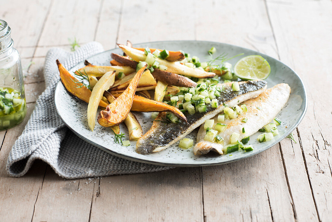 Sea bass fillet with cucumber tartare, sweet potatoes and parsnips