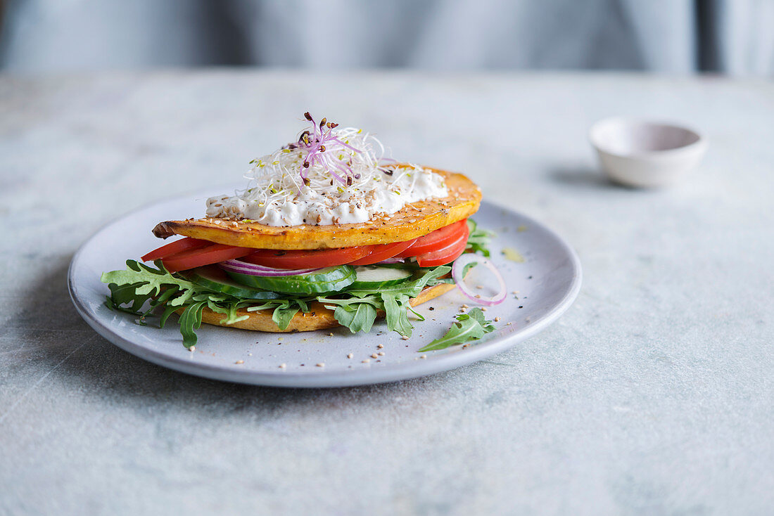 Sweet potato croque with tomato, cucumber and rocket salad