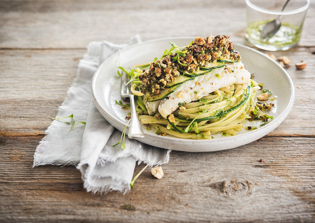 Cod with dried fruit crust served with courgette noodles