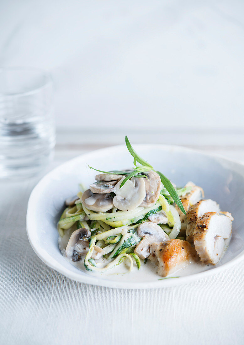 Courgette spaghetti with mushroom sauce and chicken breast