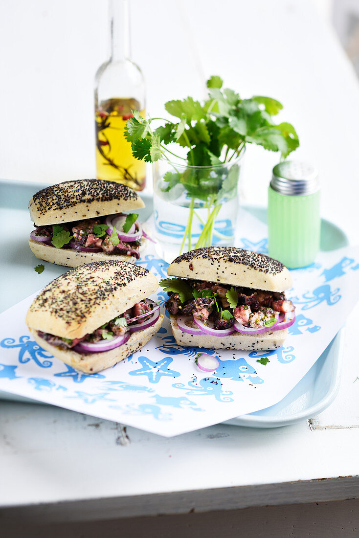 Octopus,green pesto and red onion sandwich