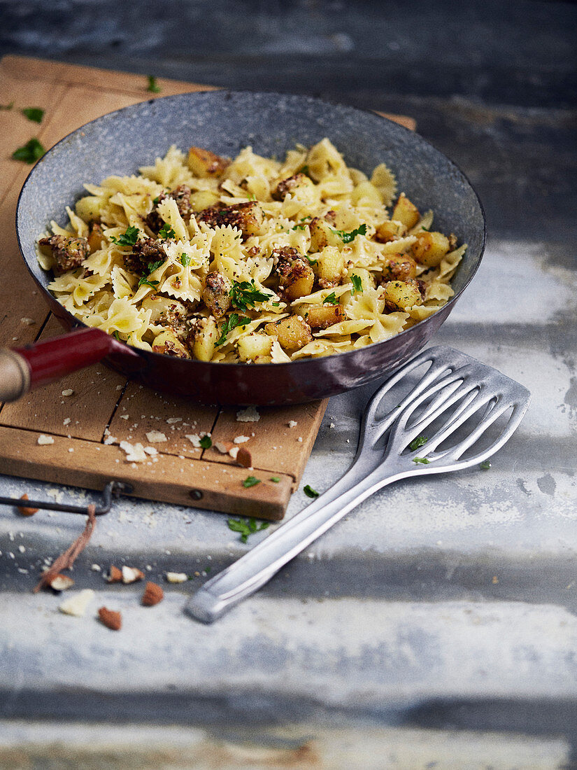 Farfalle with potatoes and bread