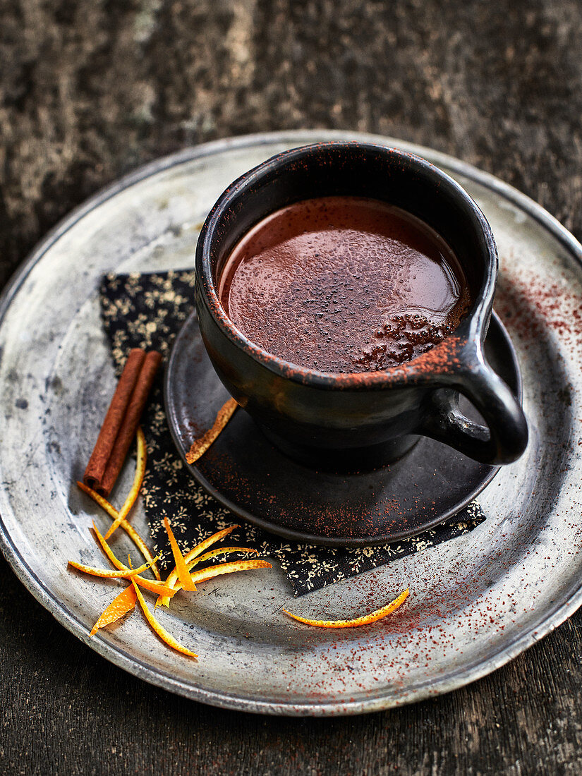 A cup of hot chocolate with spices