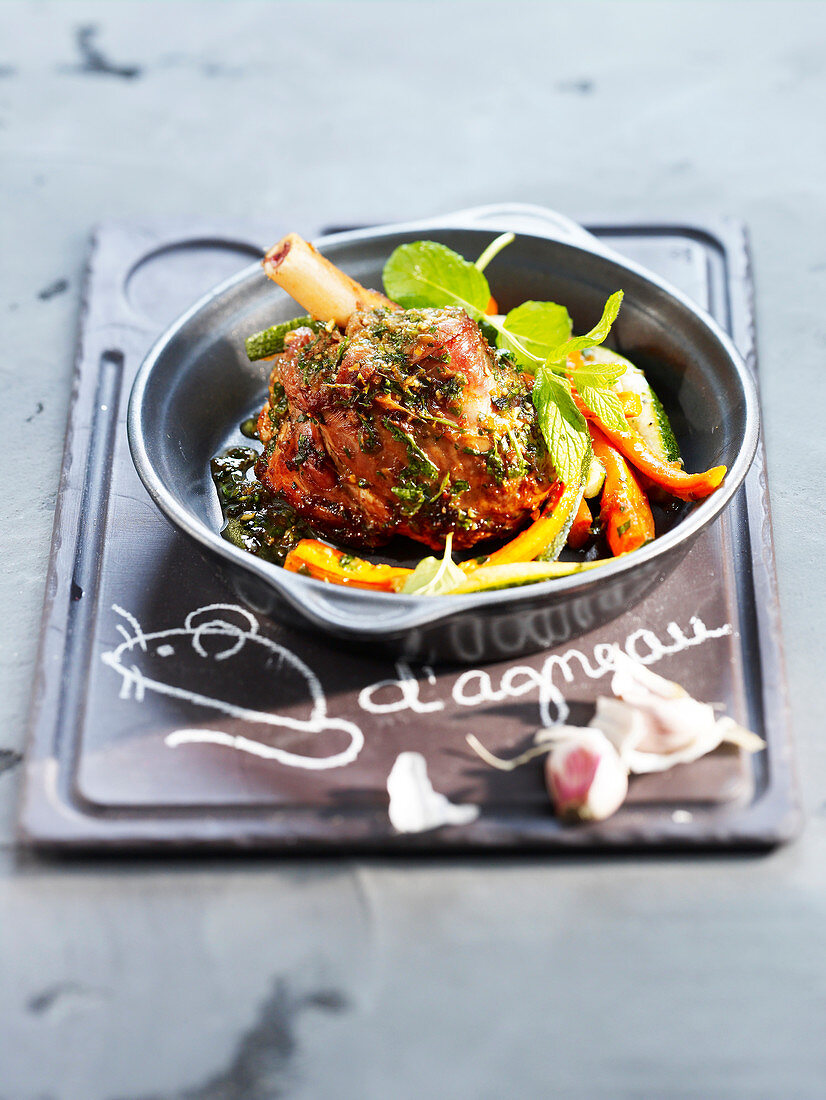 Lamb shank with herbs and spring carrots
