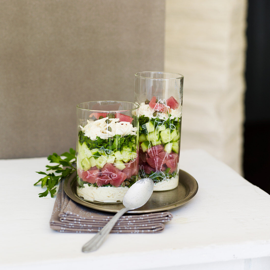Layered dish with celery remoulade, red tuna and wasabi