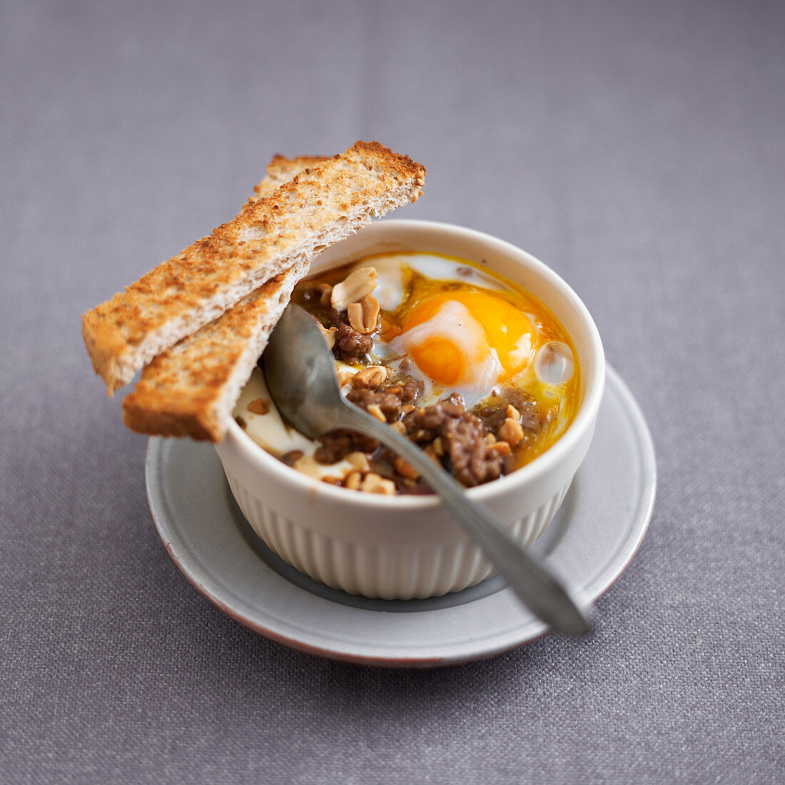 Shirred eggs with ground beef,peanuts and sweet and sour sauce
