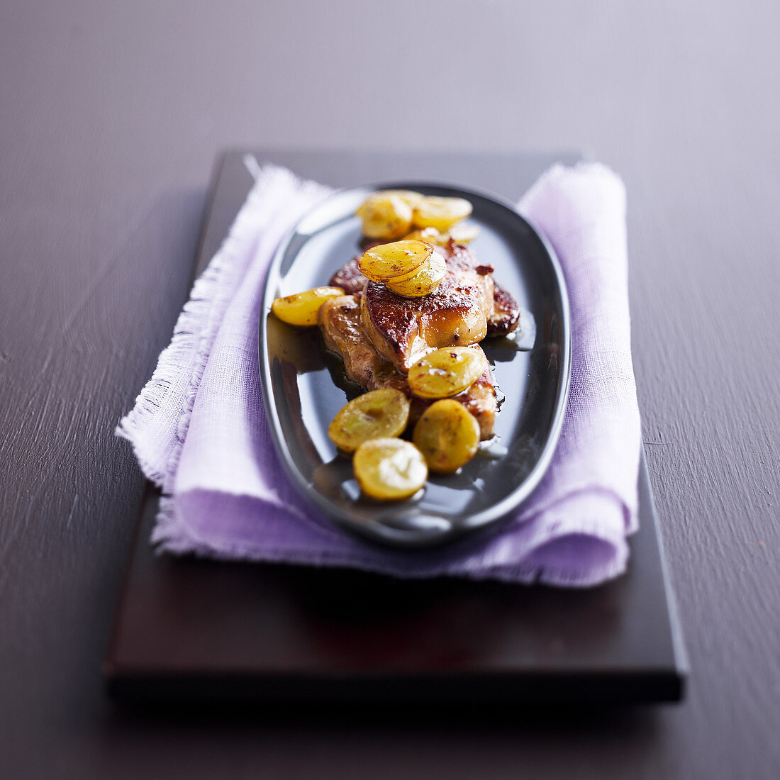 Pan-fried foie gras with cider and white grapes