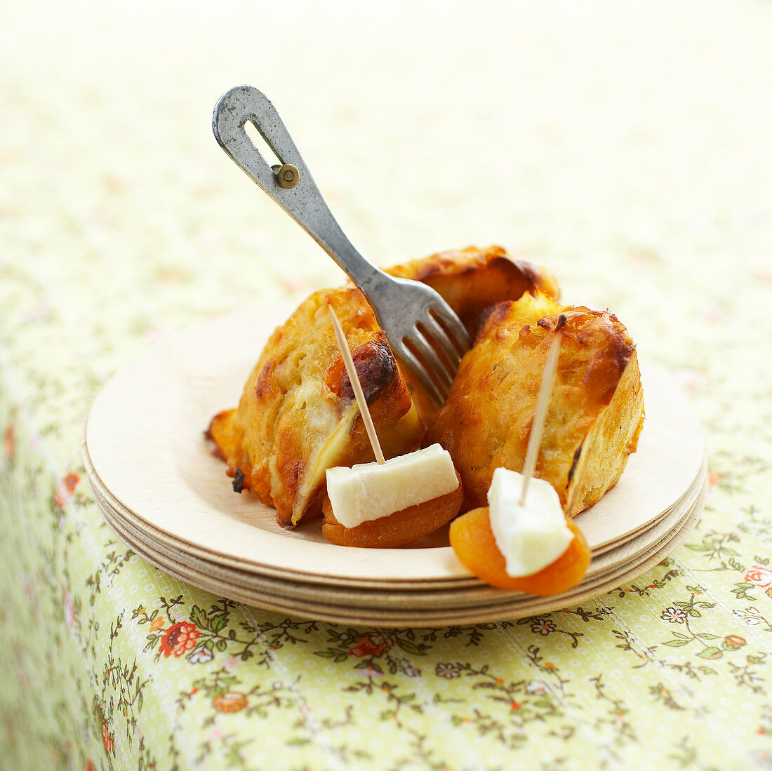 Madeleines with goat's cheese and apricot skewers