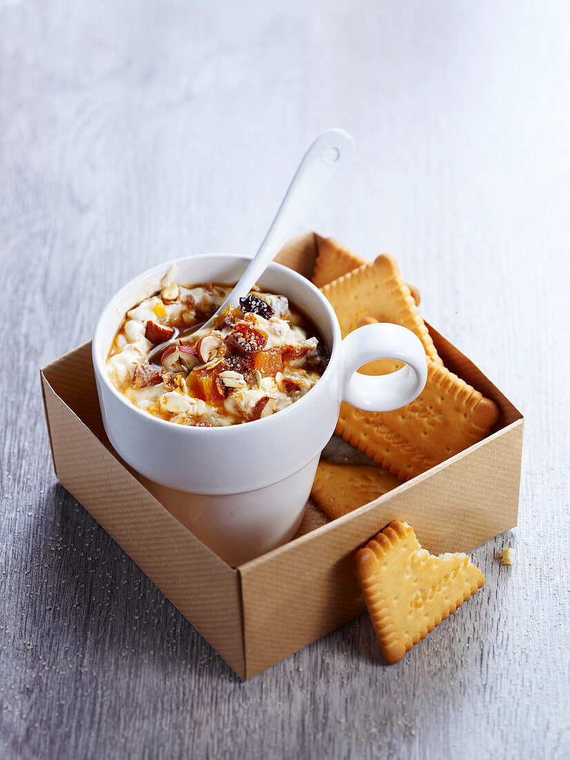 Muesli with dried fruits and nuts, served with butter biscuits