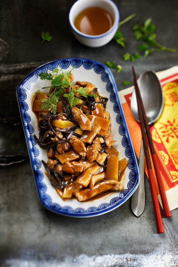 Roast pork with bamboo shoots and black mushrooms