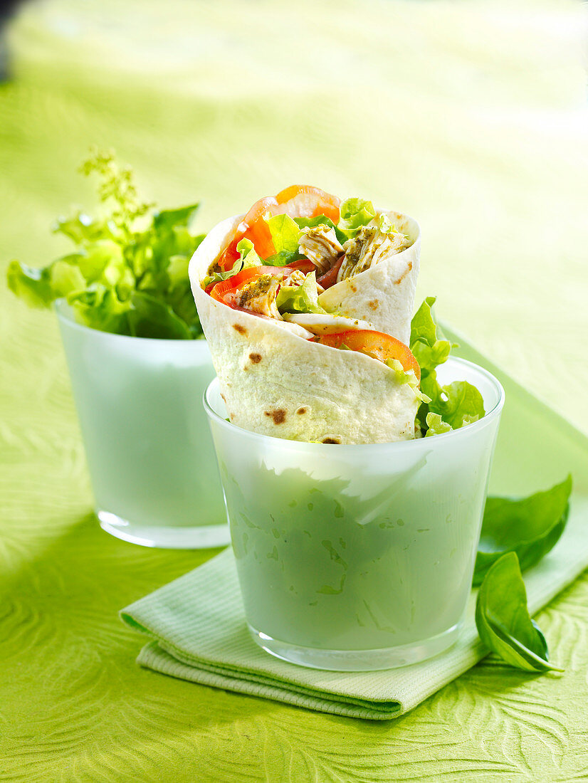 Chicken wraps with lettuce and tomatoes