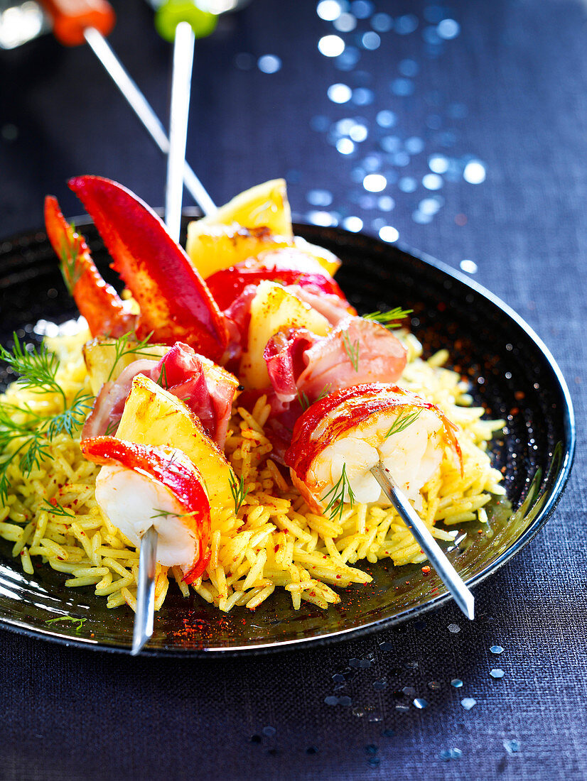 Lobster skewers with pineapple on rice (Christmas)