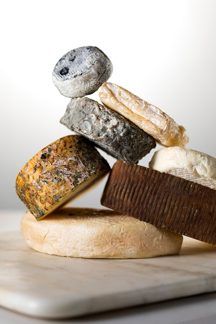 Various goat’s cheeses, stacked