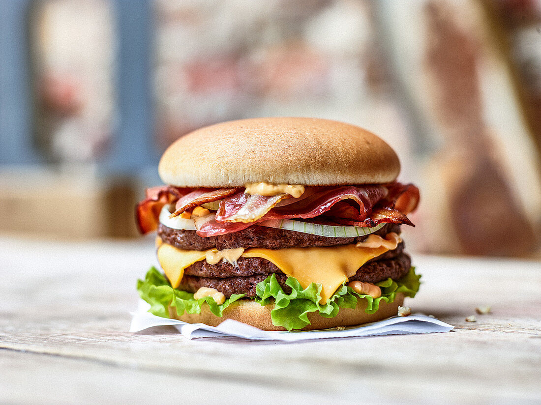 Beef burger with bacon, cheese and onions