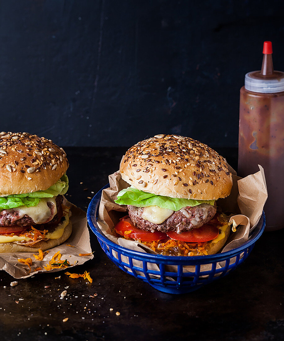 Beef burgers with cheese, tomato and lettuce