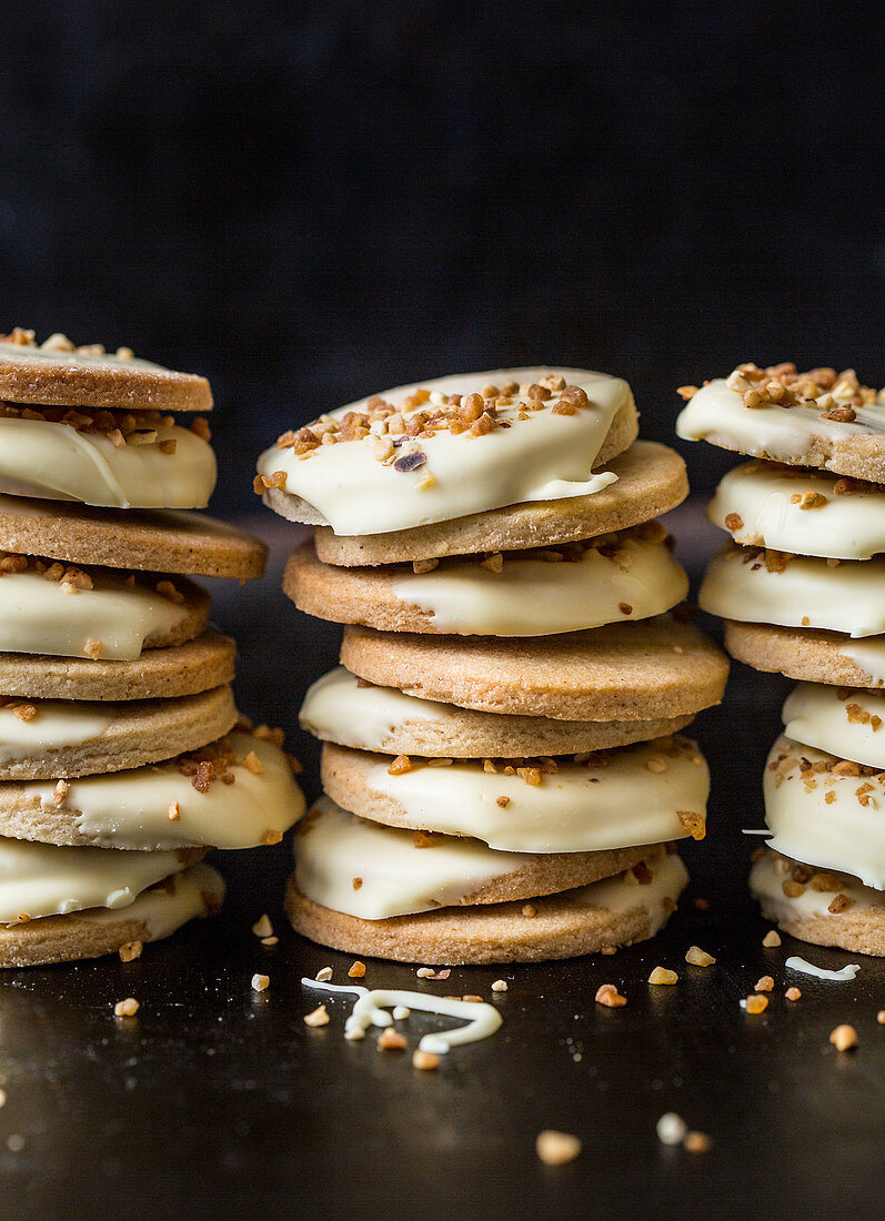 Shortbread biscuits with white chocolate icing, stacked