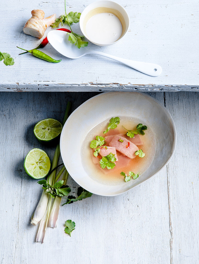 Tuna broth with coconut and lime