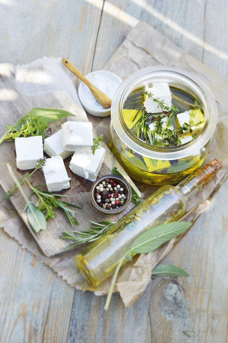 Pickled goat’s cheese with olive oil, herbs and pepper