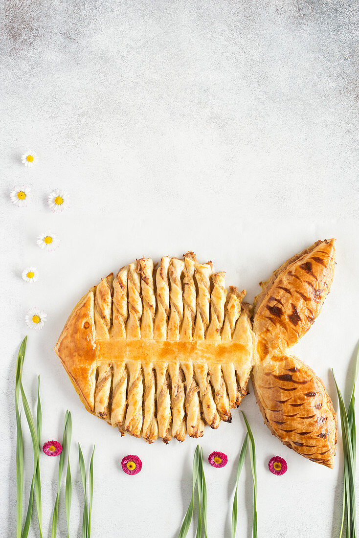 Puff pastry shaped like a fish, with tuna filling