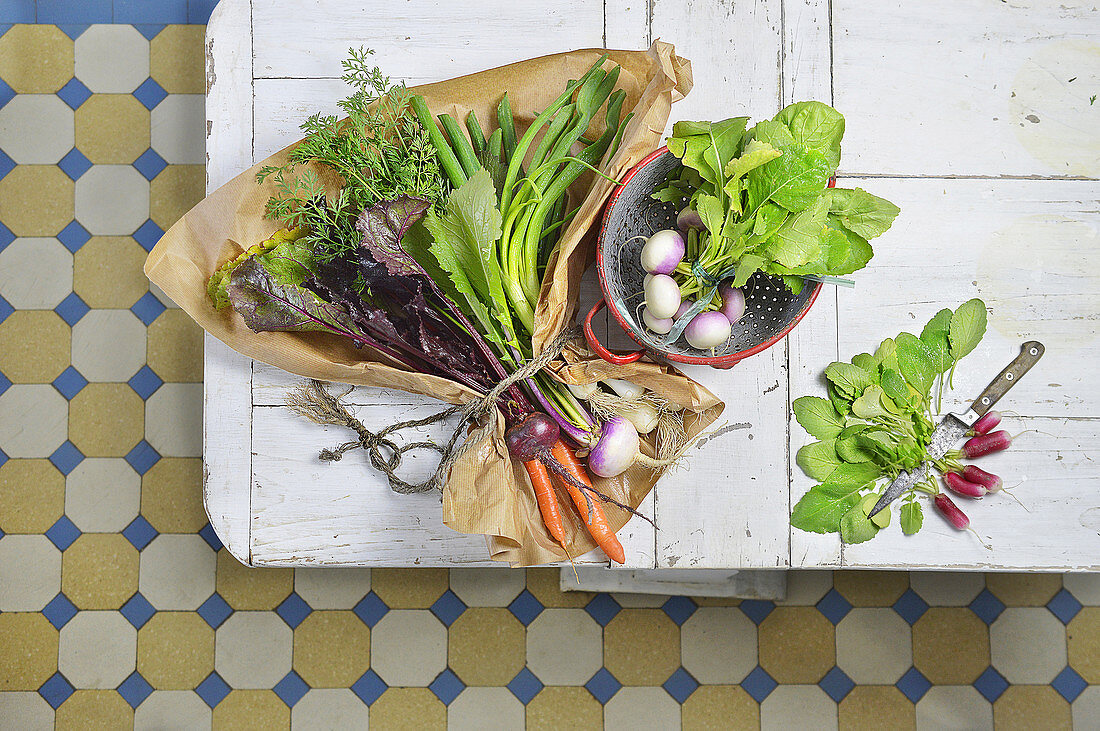 Fresh garden vegetables with greens