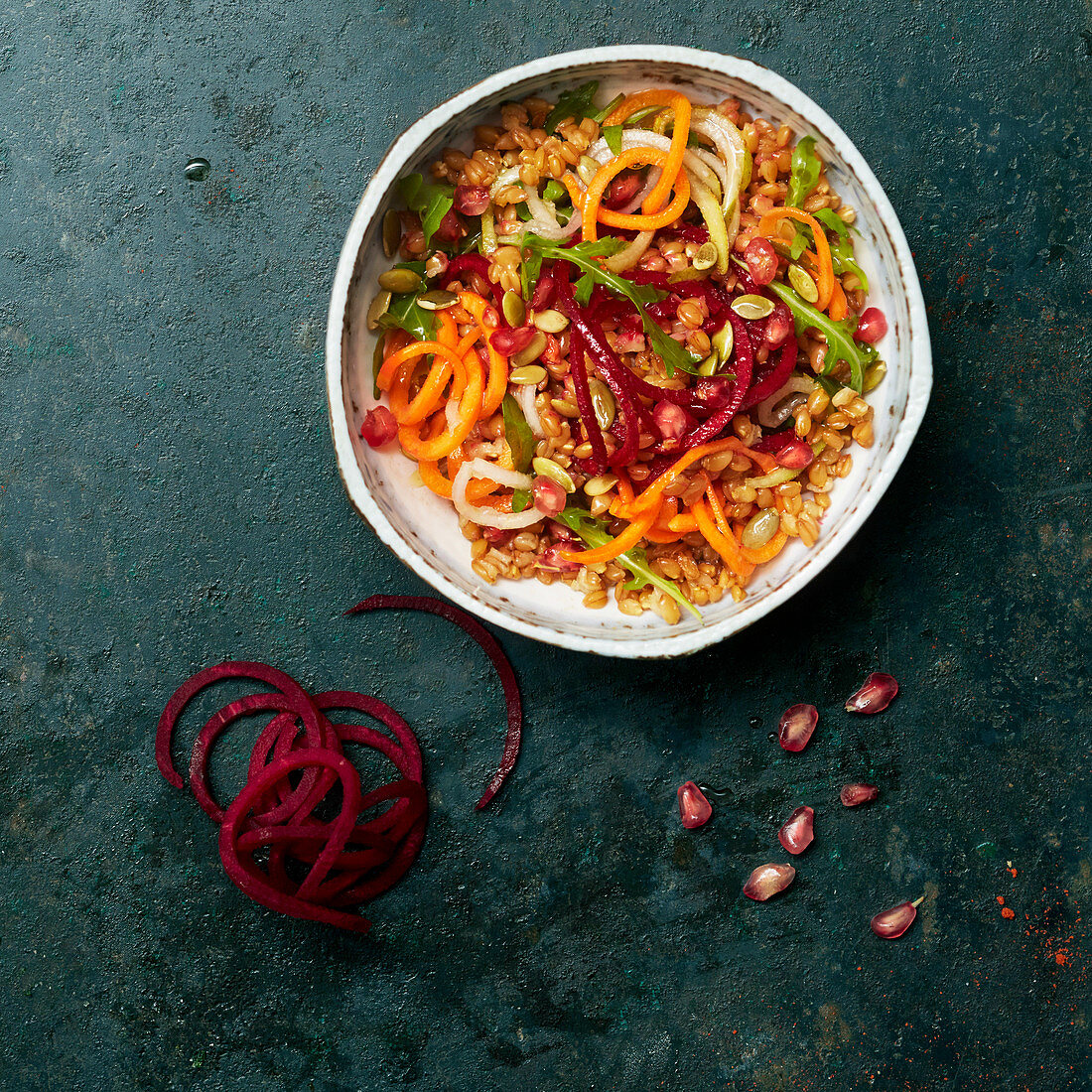 Wheat salad with carrot and beetroot spaghetti