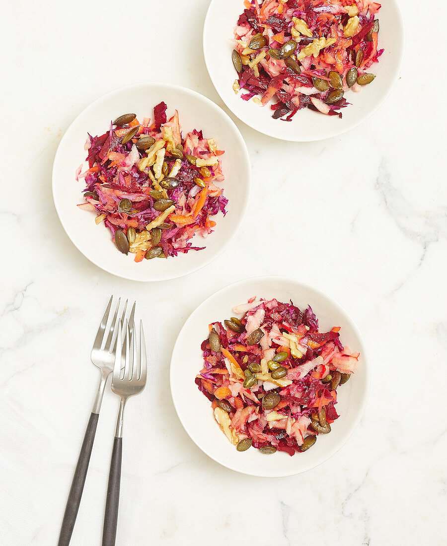 Red cabbage salad with walnuts and pumpkin seeds