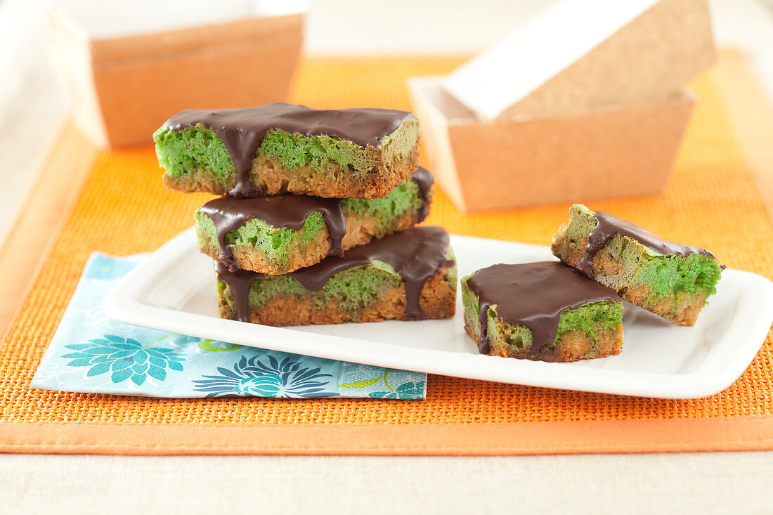 Pistachio cereal bars coated with dark chocolate