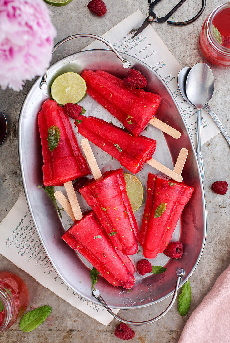 Raspberry sorbet sticks with lime and mint