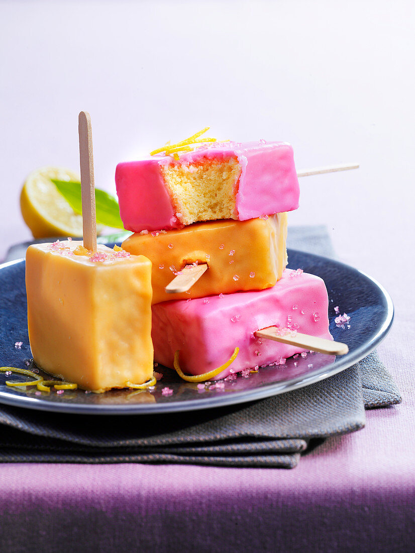 Orange and pink cake lollies