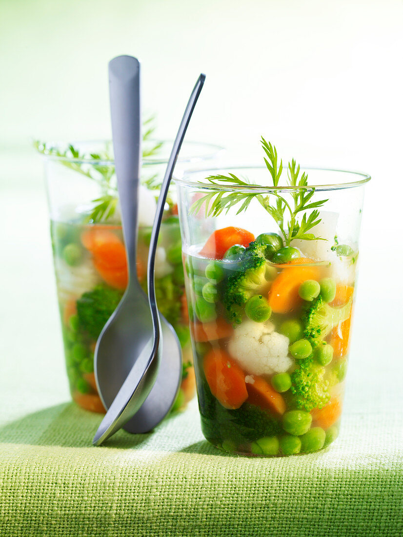 Spring vegetables in aspic, served in jars