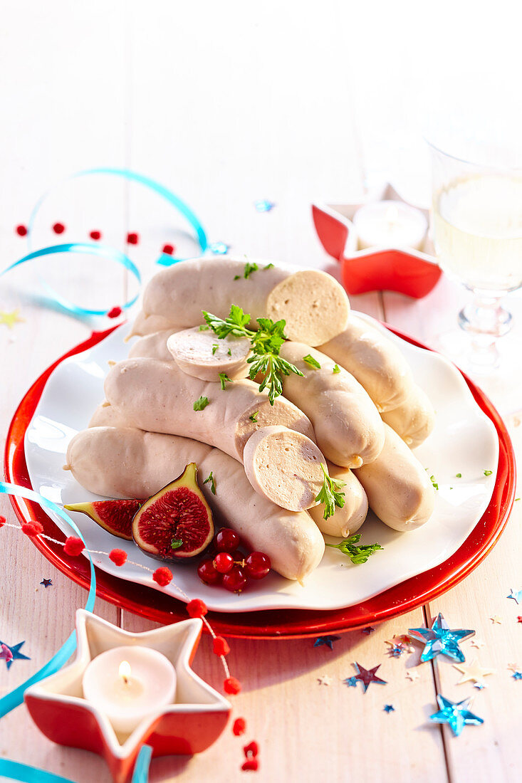 Boudin Blanc (white blood sausages, France) decorated for Christmas
