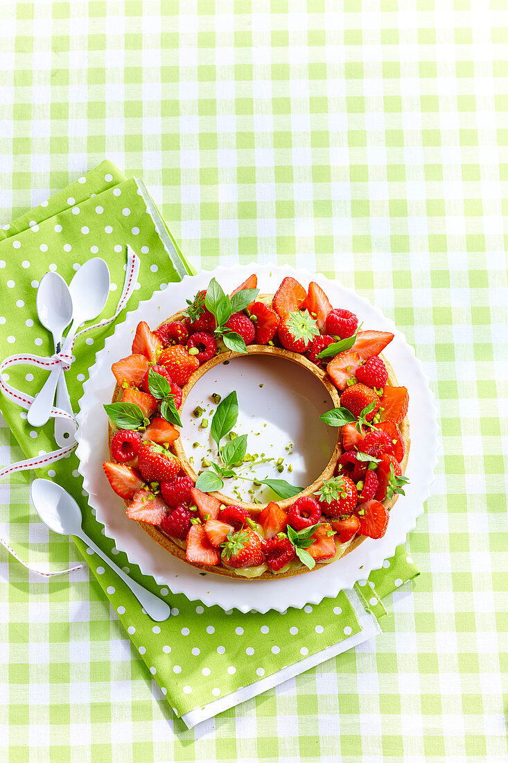 Summer ring cake with strawberries and raspberries