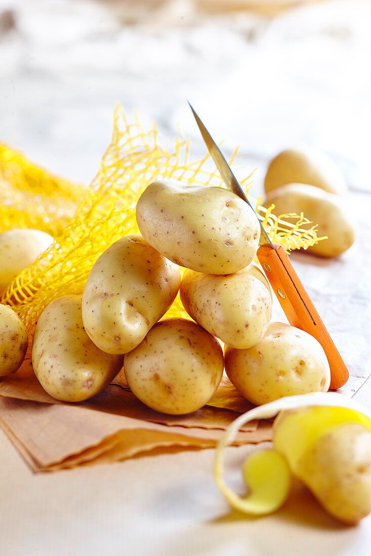 New potatoes, partly peeled