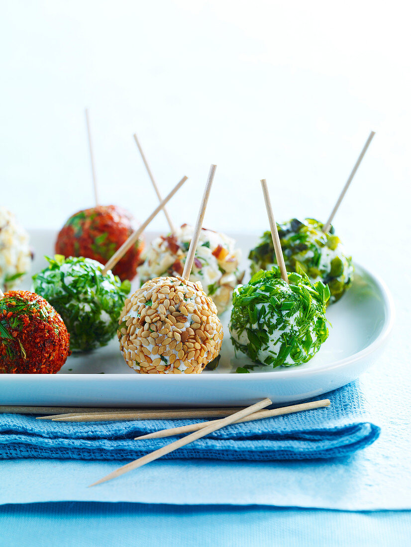 Goat’s cheese balls with herbs, sesame and pepper powder (appetisers)