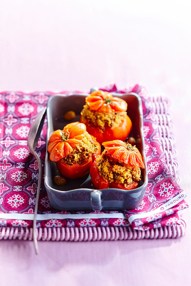 Stuffed tomatoes with couscous and sultanas